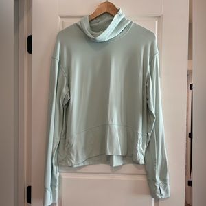 Lululemon Ready to Rulu, size 10 pullover in pastel green.